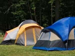 two camping tents in the field